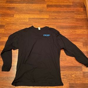 deep fish shirt with bigger fish on back of shirt